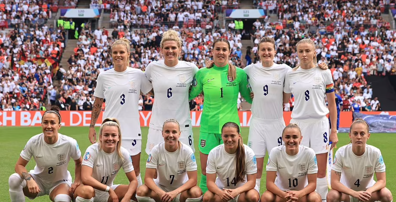 The Lionesses pose up for their team picture before kick-off the focus etched onto some of their faces. Credit to AP