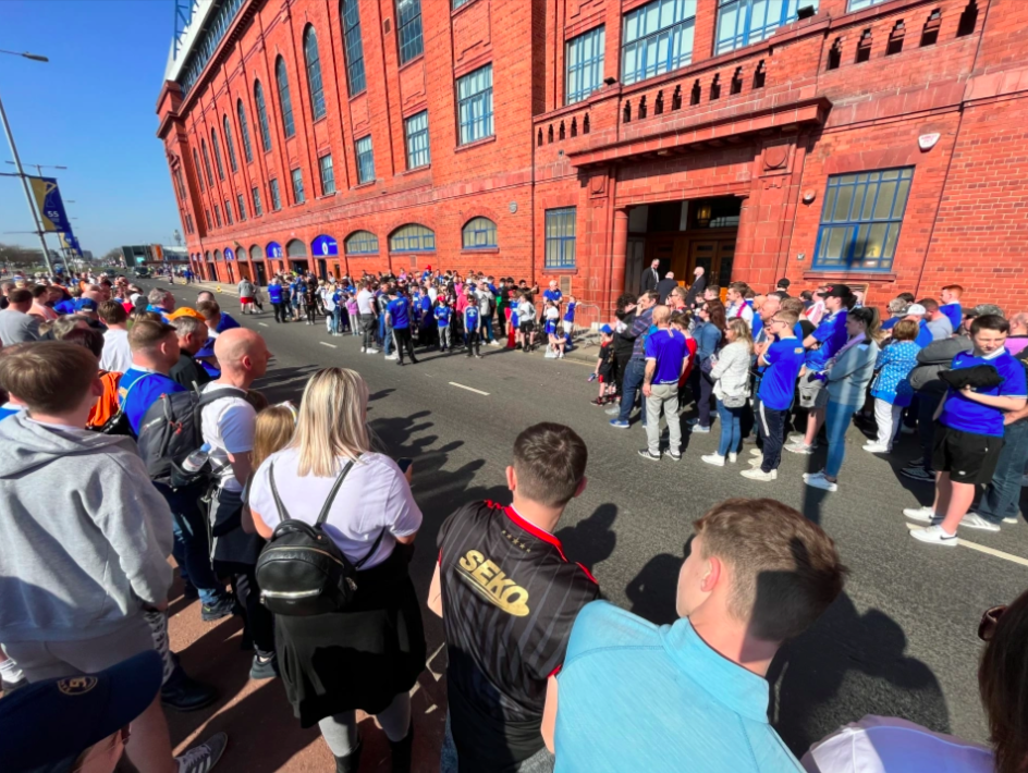 Fans waiting for their heroes to arrive. Credit to The Scottish Sun